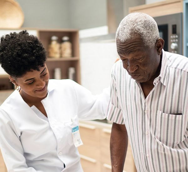 short-term-rehab-near-morrisville-ny-image-of-medical-professional-assisting-elderly-man-from-crouse-community-center